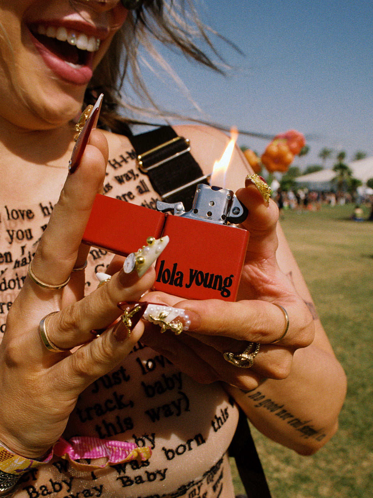 Lola Young - lola young red flip lighter